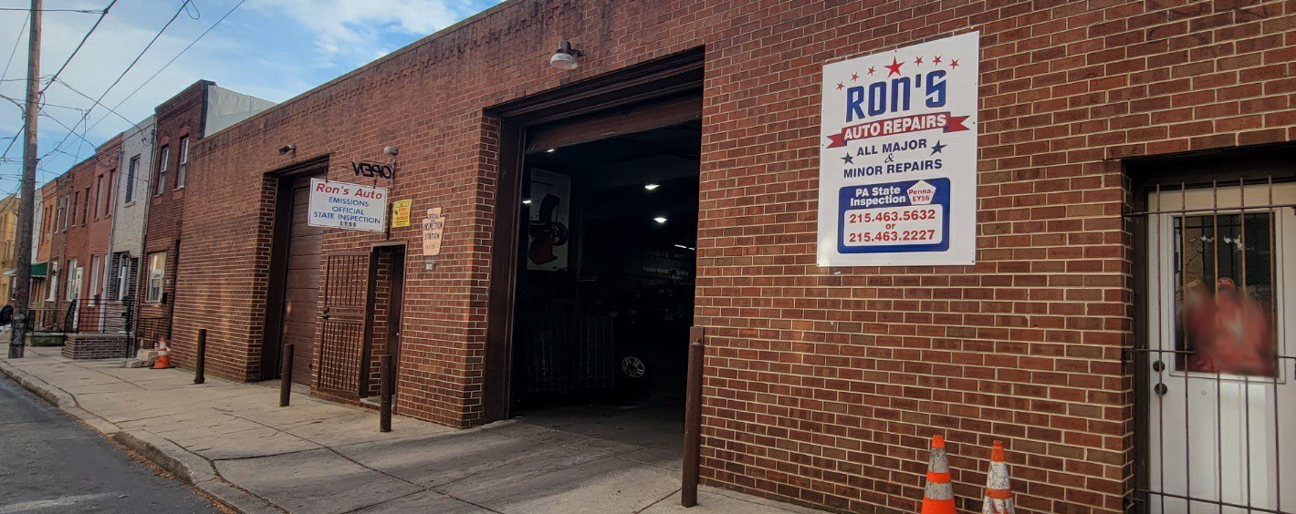 view of the outside of the mechanic shop